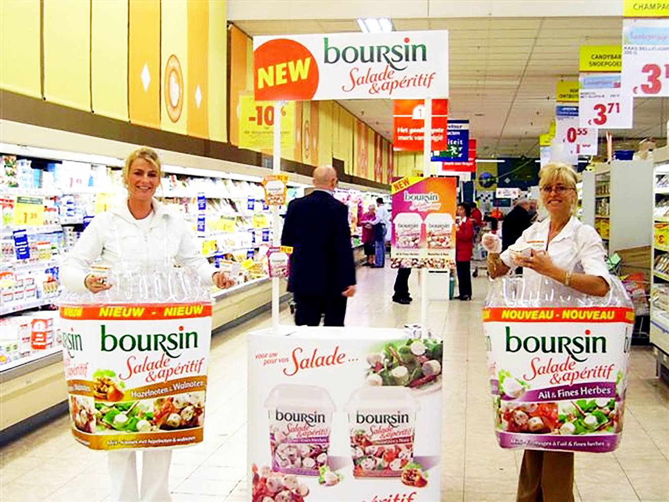 Miniature inflatable product enlargements inflatable airtight Boursin cheese costume during a sampling brand activation inside the supermarket X-Treme Creations