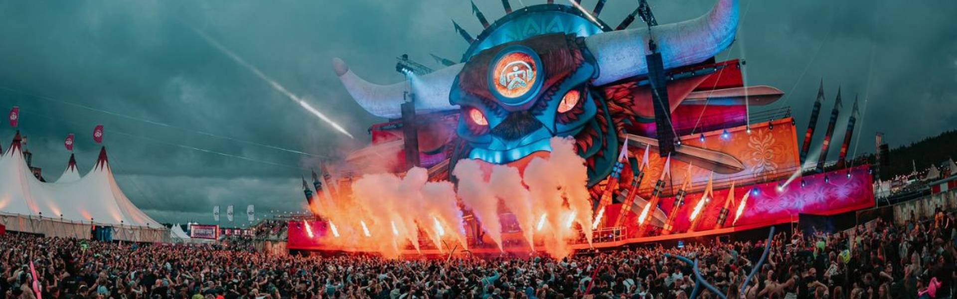Large inflatable promotional material | X-Treme Creations Airbeat One Festival - People dancing in front of a bull-shaped stage with inflatable horns Airbeat One Full Scope X-Treme Creations