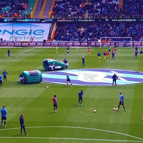 Innovative concepts We design your ideas mobile inflatable Bosch lawnmower robot cutting the soccer grass field at Club Brugge X-Treme Creations