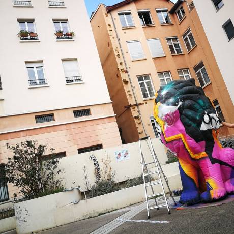Art and Design Art and marketing come together inflatable seated lion being decorated by world famous graffitti artists during Presqu'île in the beautiful city of Lyon X-Treme Creations