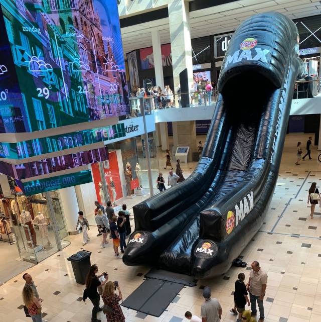 Brand activation Raise your brand awareness inflatable slide Lays as Pepsi Max brand activation inside a shopping mall in Utrecht X-Treme Creations