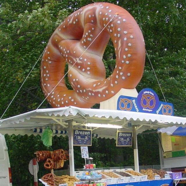 Giant inflatable product enlargements Inflatatable tasty product replica of a Pretzel cookie installed on the roof of a German foodtruck X-Treme Creations