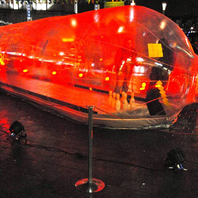 Giant inflatable stands Inflatable transparent dome in the shape of a condom of 12 m long which is used to play Petanquesale X-Treme Creations