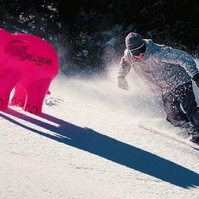 X-Treme Creations Miniature inflatable elephant off slope snowboarding in the French Alps