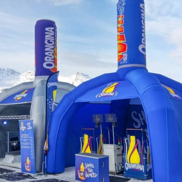 Giant inflatable tents Blow-up tents Orangina with removable 3D Orangina cans along the ski slopes  X-Treme Creations