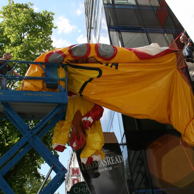 X-Treme Creations inflatable yellow submarine installed by team X-Treme onto the steel carrying structure