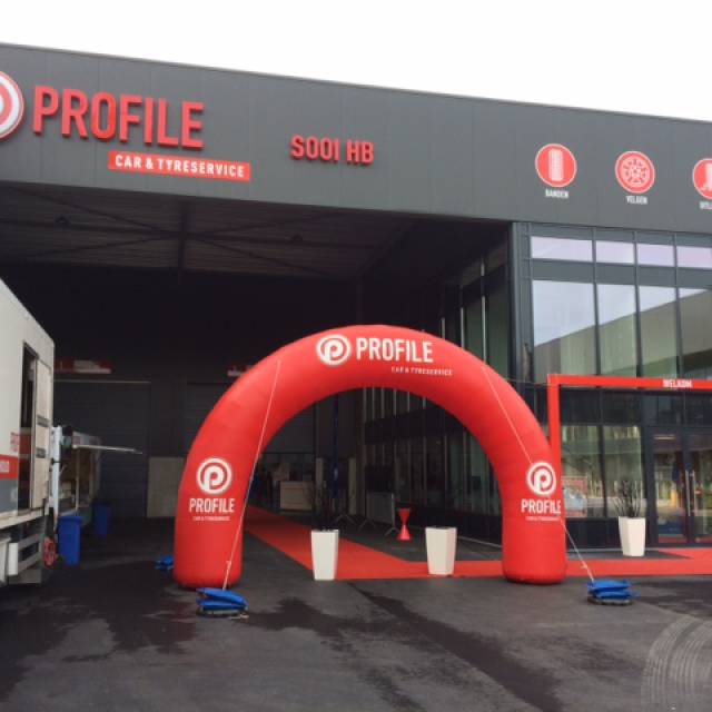 Giant inflatable arches Inflatable round arch Profile Tyre installed at the entrance of a Profile Tyre Center point of saleretail  X-Treme Creations