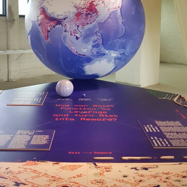 Miniature airtight inflatable balls airtight inflatable globe of 3 m diameter for an architectural exhibition by Dutch event agency Made by Mistake X-Treme Creations