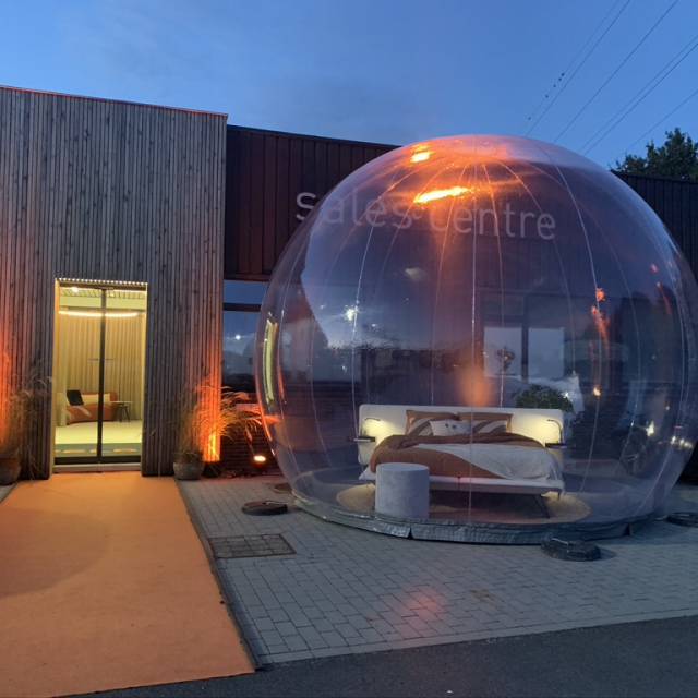 The transparent eyecatcher for your event! inflatable decorative bedroom inside a transparent vinyl bubble stand with permanent blower driven point-of-sale Velda bedding X-Treme Creations