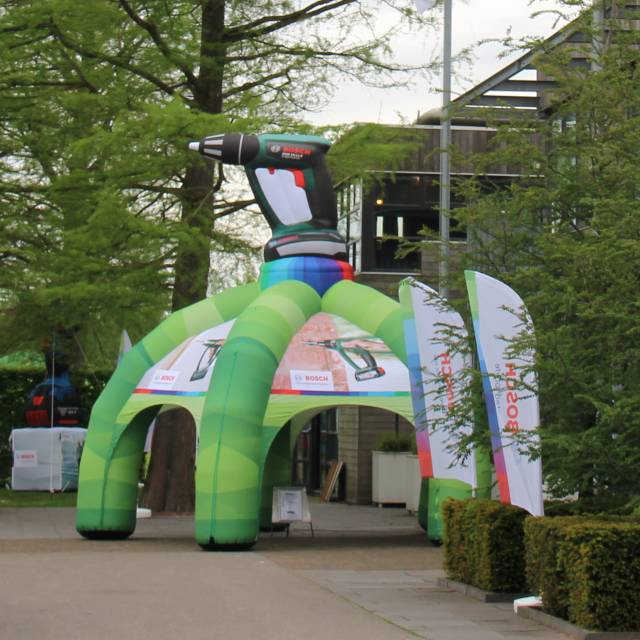 Giant inflatable tents Inflatable five legged 7 m diameter tent Bosch with a 3D drill on top as an external workshop X-Treme Creations