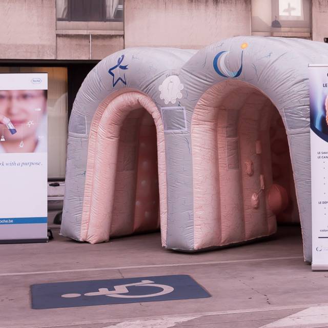 Giant inflatable stands inflatable gutter with informative sections for the fight against bowel disease for Chirec Braine hospital  X-Treme Creations