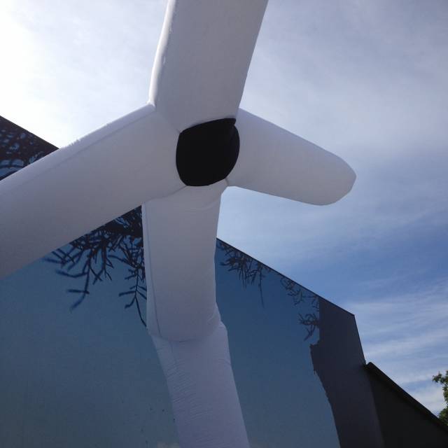 Giant inflatable skydancer Inflatable dynamic tube in the shape of a 3D tailor made windmill with one leg and a silent blower X-Treme Creations