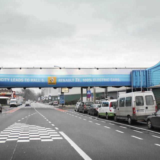 X-Treme Creations 18 meter long inflatable mega plug Renault Electric Vehicles above important access road car salon 