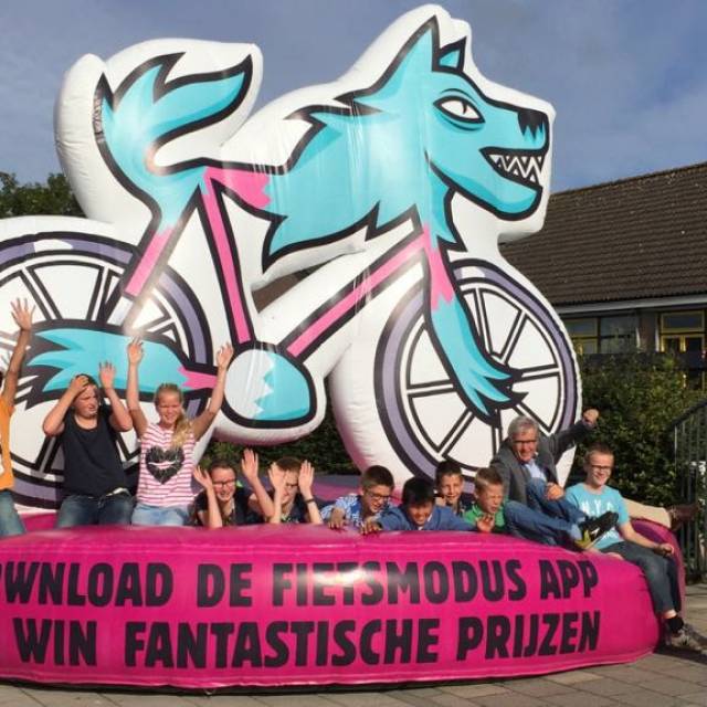 Giant inflatable Furnitures Inflatable tailor made sofa with a 2D biking wolf character to motivate youngsters to take their bicycle to ride to and from school  X-Treme Creations