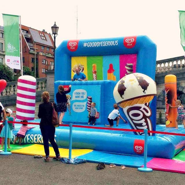 Giant inflatable games inflatable bouncer Ola Are You Serious with 3D ice cream decoration and incorporated DJ booth for the agency Demonstr8 X-Treme Creations