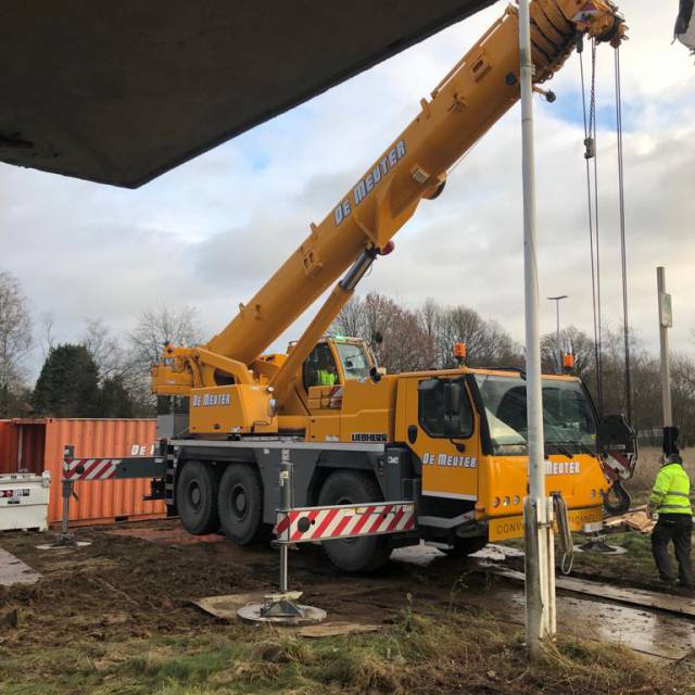 X-Treme Creations Inflatable transparent bubble with a crane in front gettting ready for the lift