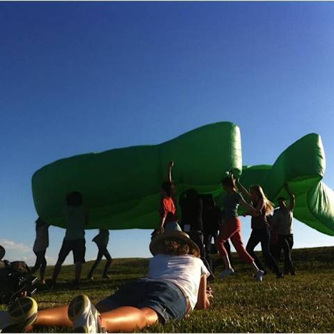 Large inflatable promotional material | X-Treme Creations Inflatable green Mobistar kite is worn by people in a field Art and Design  & Promotion and gadgets  &  Caviar for AIR for Mobistar Tanker - Art direction, production design & props X-Treme Creations