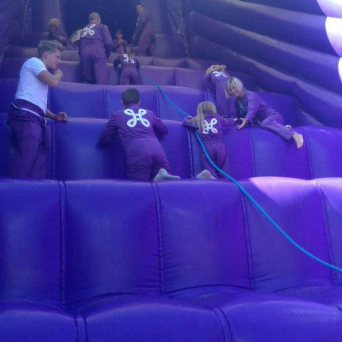 Large inflatable promotional material | X-Treme Creations inflatable purple stairs animation game with children climbing up to get down from the slide  Events  & Corporate branding  & Brand activation  &  Proximus Demonstr8 X-Treme Creations
