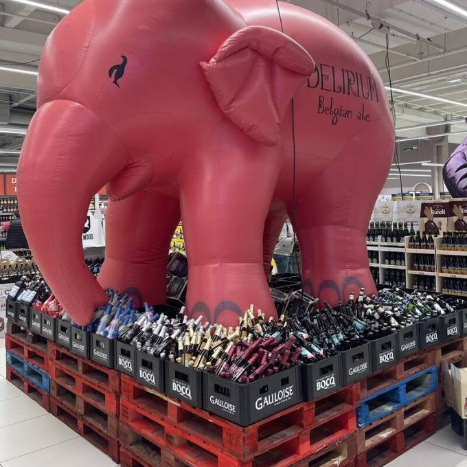 Large inflatable promotional material | X-Treme Creations giant inflatable elephant Delirium in Hyper U supermarket as an impressive point of sale eye-catcher POS/POP  & Promotion and gadgets  &  Huyghe Brewery X-Treme Creations