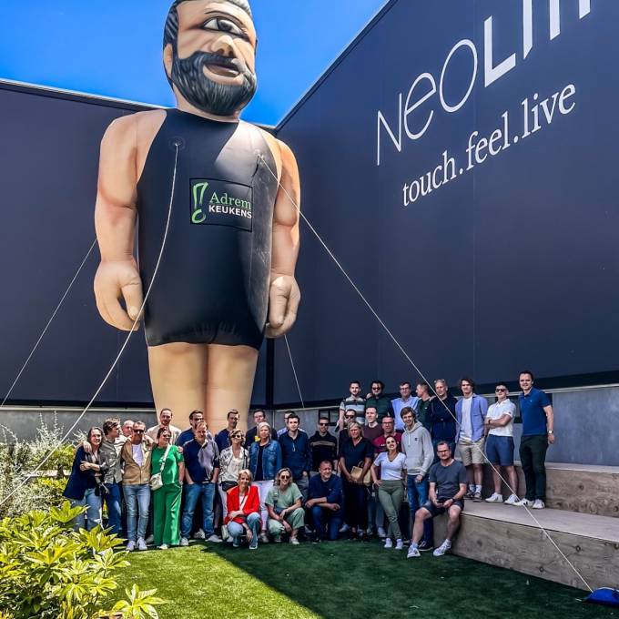 Large inflatable promotional material | X-Treme Creations eye-catching giant inflatable Greek cyclop called Médar in point-of-sale Neolith  Events  & Art and Design  & Corporate branding  &  Adrem Keukens X-Treme Creations